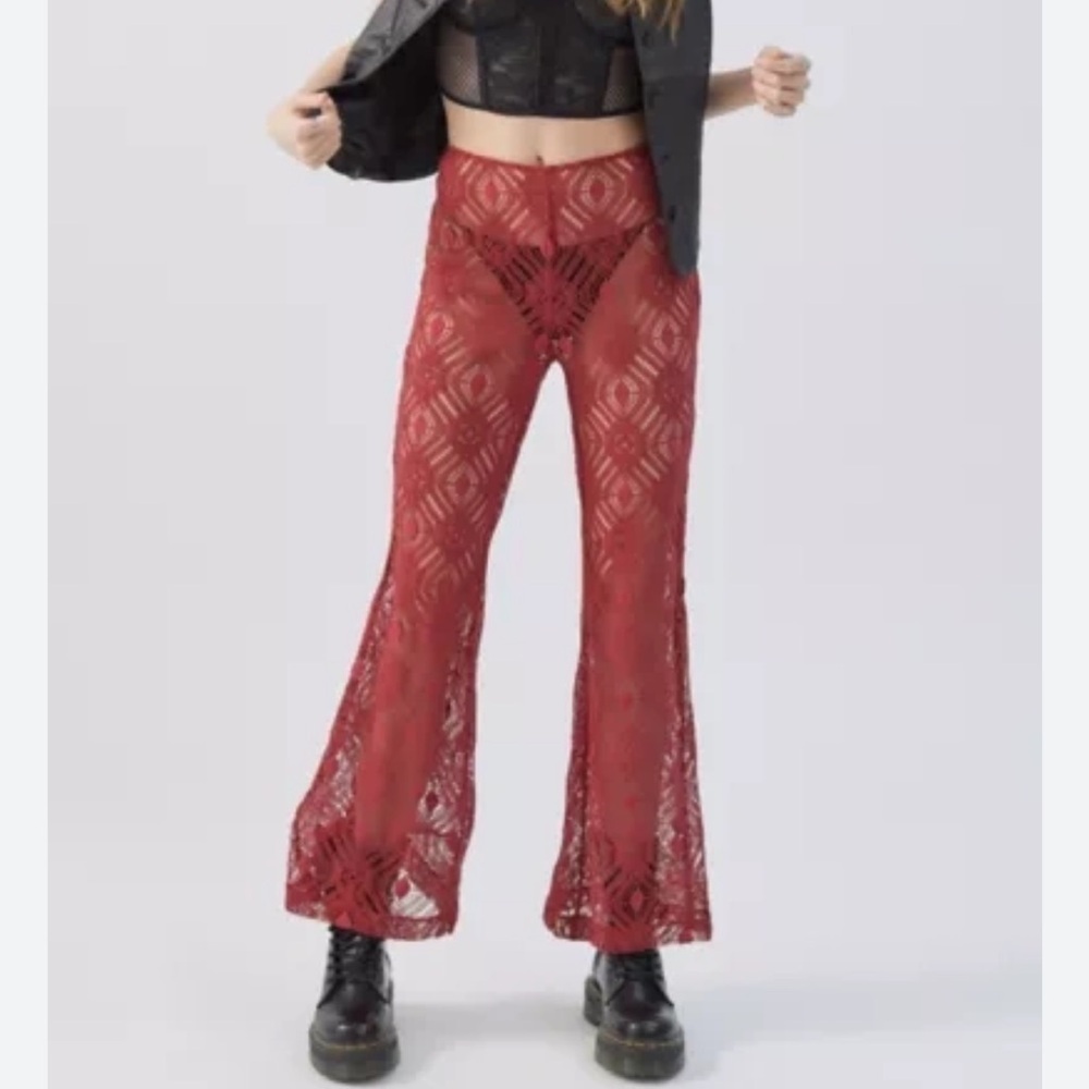Urban Outfitters - Crocheted Lacy Brick Red Flare Pants - size 10